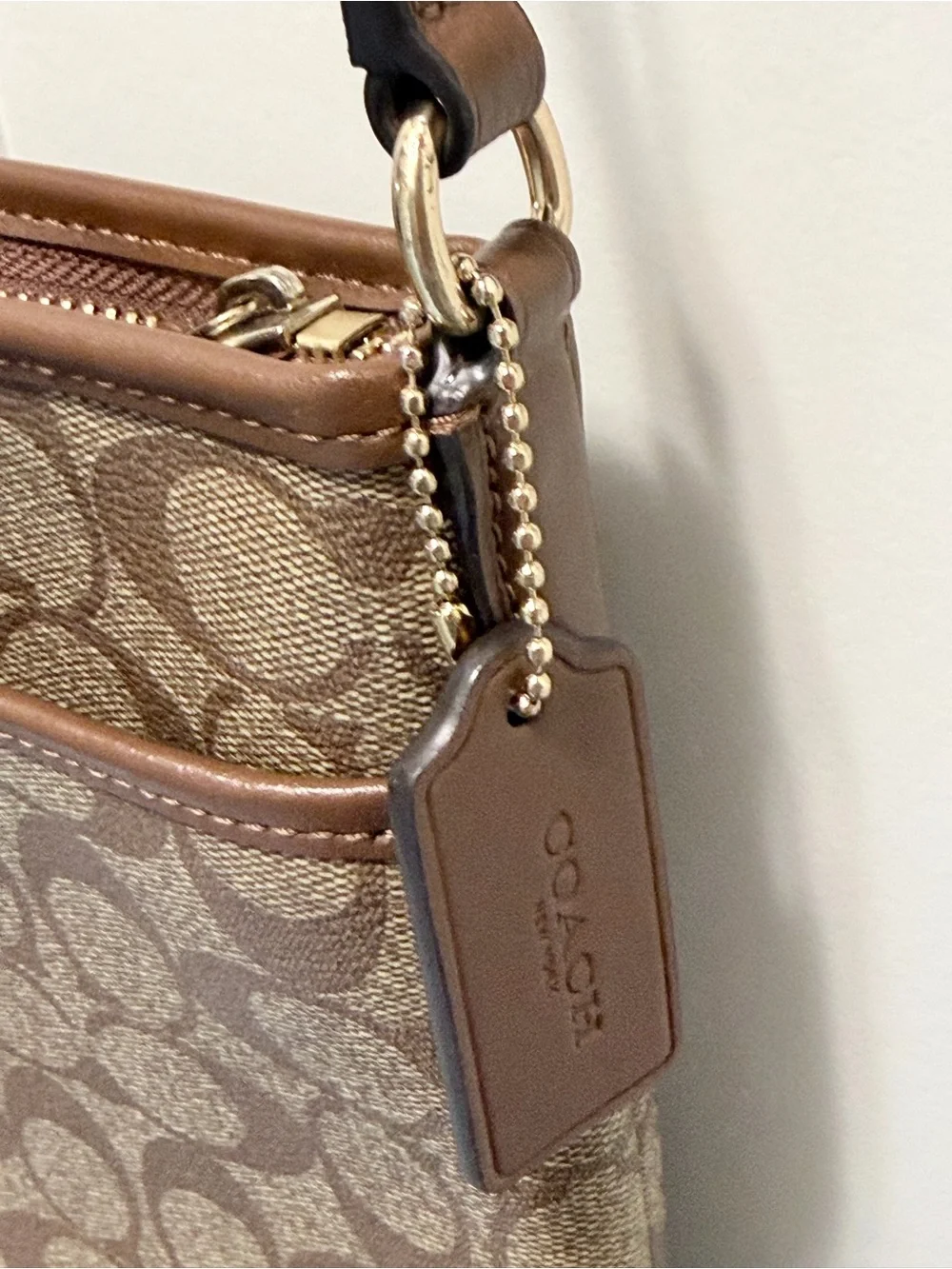 Coach Signature File Crossbody Bag. One of Coach's most popular daily silhouette